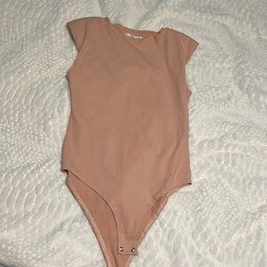 Light pink bodysuit blouse